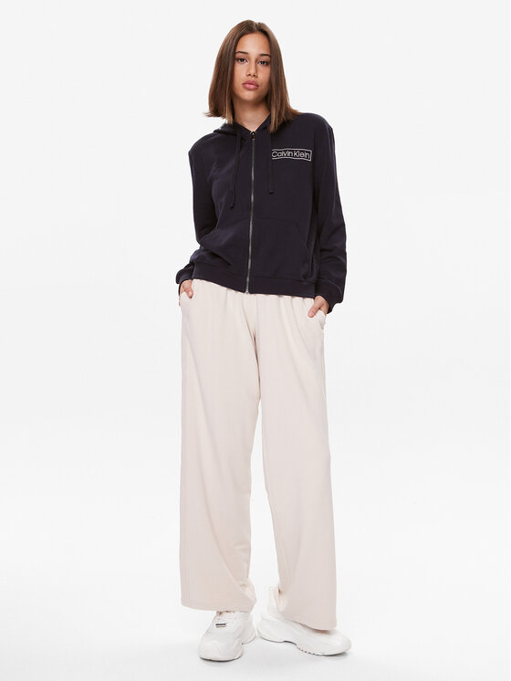 Tommy Hilfiger Tommy Hilfiger Долнище анцуг UW0UW04771 Бежов Relaxed Fit