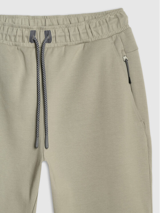4F 4F Spodnie dresowe SIMPLE UTILITY Turkusowy Regular Fit