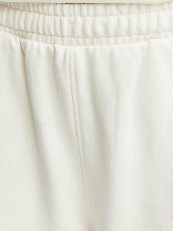 Tommy Hilfiger Tommy Hilfiger Долнище анцуг UW0UW06628 Кремав Wide Leg