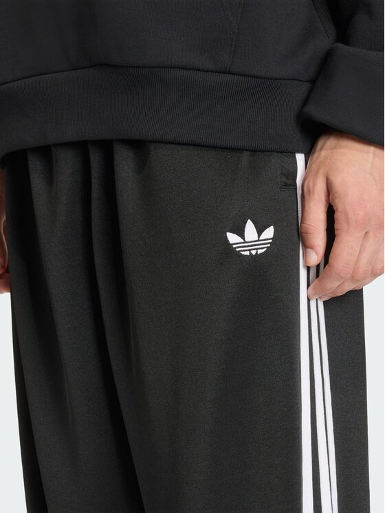 adidas adidas Spodnie dresowe ADICOLOR LOOSE Czarny Loose Fit