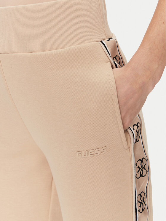 Guess Guess Spodnie dresowe V2YB15 KB3P2 Beżowy Regular Fit