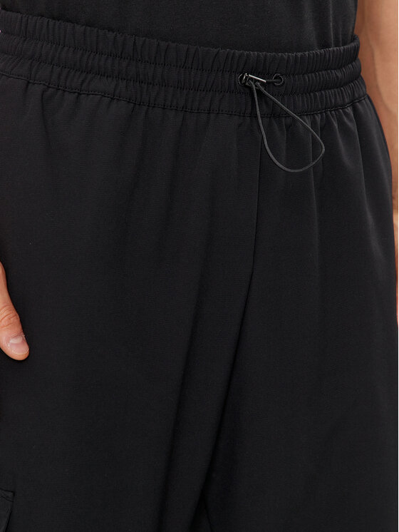adidas adidas Pantaloni da tuta City Escape IR5179 Nero Regular Fit