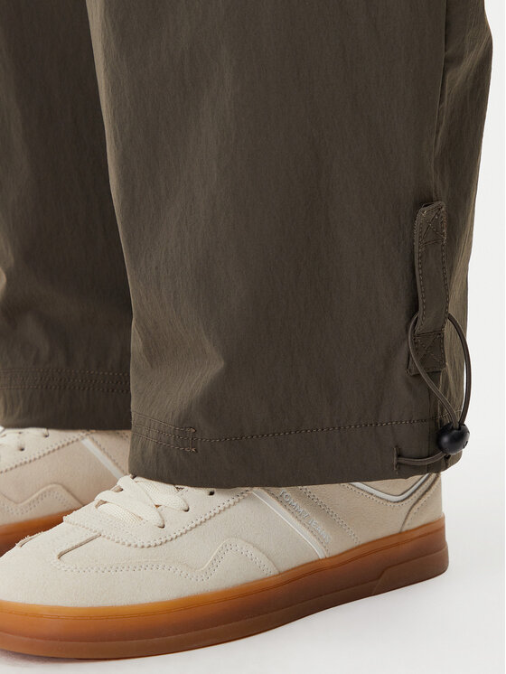 adidas adidas Pantaloni din material Premium Essentials JD4785 Kaki Loose Fit