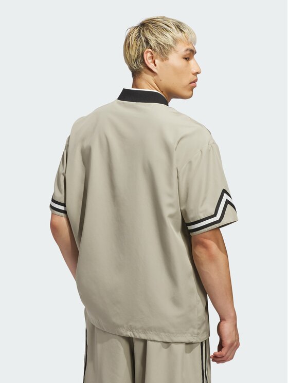 adidas adidas Koszulka techniczna 158865 Brązowy Loose Fit