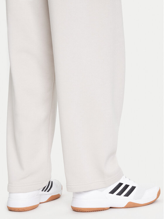 adidas adidas Spodnie dresowe Collegiate JM9177 Beżowy Regular Fit