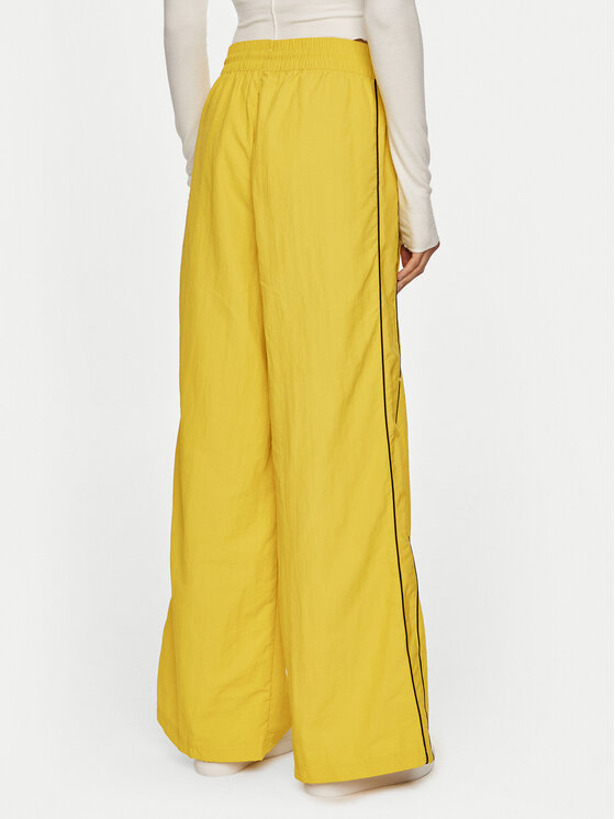 Puma Pantaloni da tuta Play Loud T7 626807 Giallo Relaxed Fit Modivo