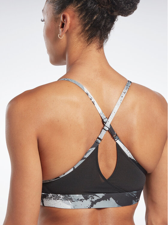 Reebok Reebok Спортивний бюстгальтер Lux Strappy Allover Print HS7793 Чорний
