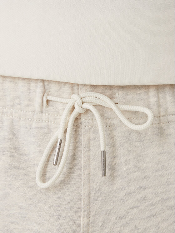 Calvin Klein Jeans Calvin Klein Jeans Spodnie dresowe Embossed Monologo LV047F206G Beżowy Wide Leg