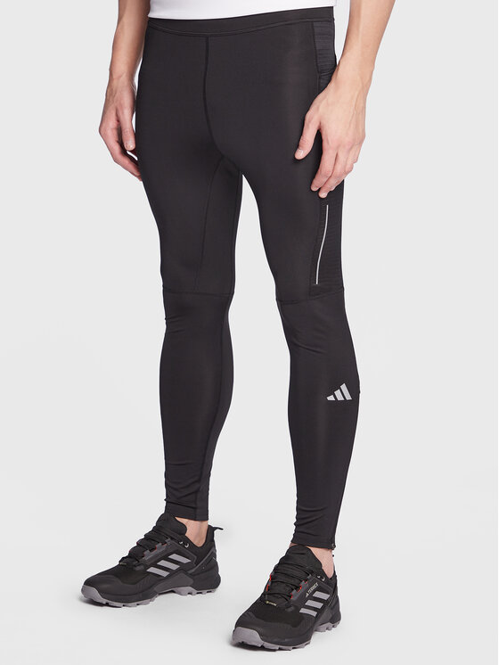 adidas Legingi Own the Run Leggings HM8444 Melns Fitted Fit