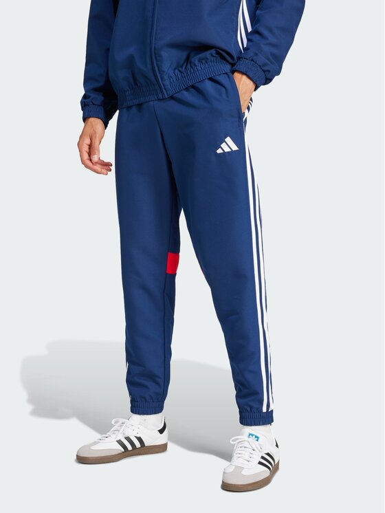 adidas adidas Spodnie materiałowe 139277 Niebieski jasny Regular Fit