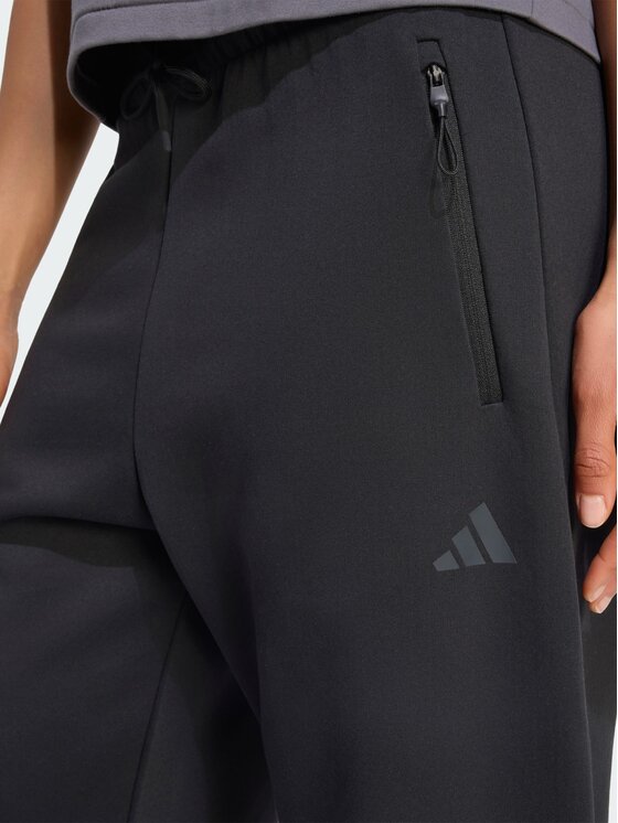 adidas adidas Medžiaginės kelnės Z.N.E. OPEN HEMZ.N.E. OPEN HEM Juoda Loose Fit