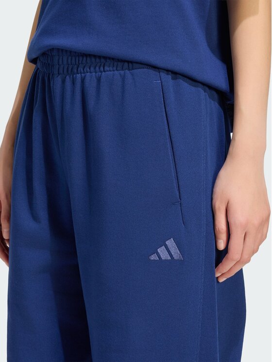 adidas adidas Spodnie dresowe KIT SMALL LOGO LOOSE CUFFED Niebieski Loose Fit