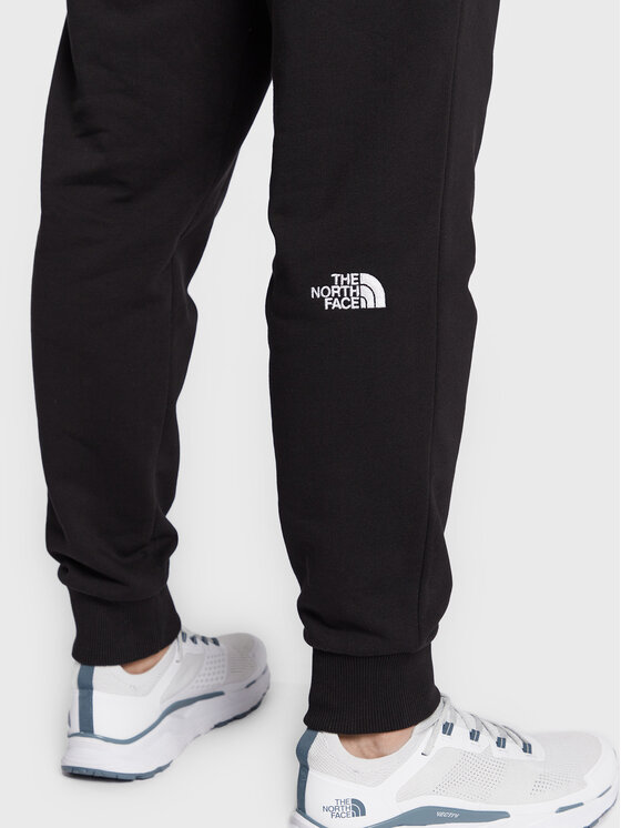 The North Face Pantalon jogging NF0A4SVQ Noir Regular Fit Modivo.fr