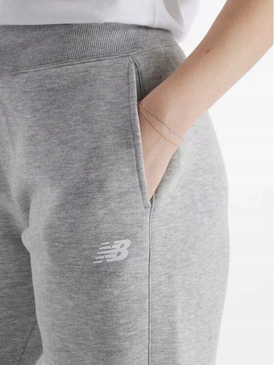 New Balance New Balance Spodnie dresowe WP43805AG Szary Standard Fit