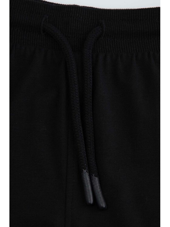 Coccodrillo Coccodrillo Spodnie dresowe WC6122101VBA-021 Czarny Regular Fit