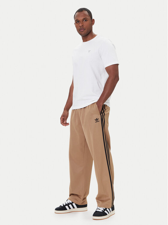 adidas adidas Spodnji del trenirke adicolor Firebird JY1419 Bež Baggy Fit