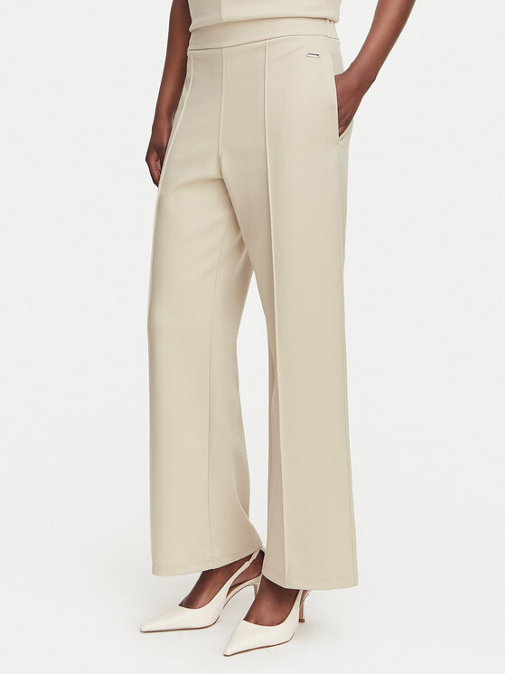Calvin Klein Hlače iz tkanine LV044G210G Bež Relaxed Fit