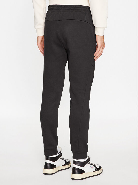 Puma Puma Spodnie dresowe Pumatech 538286 Czarny Regular Fit