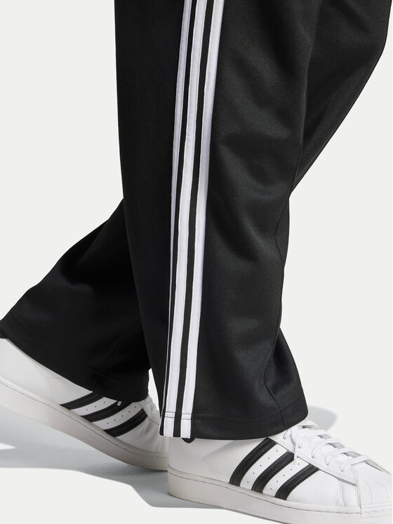 adidas adidas Melegítő alsó adicolor Firebird IZ4801 Fekete Baggy Fit
