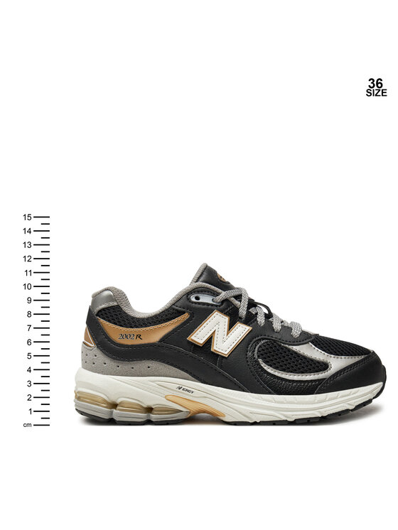 New balance 5 black gold top