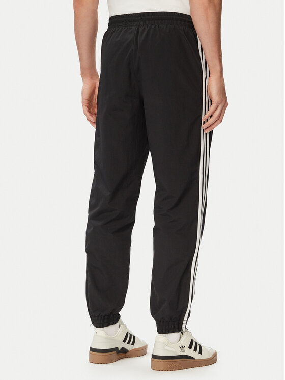 adidas adidas Teplákové nohavice Firebird Woven KE1371 Čierna Regular Fit