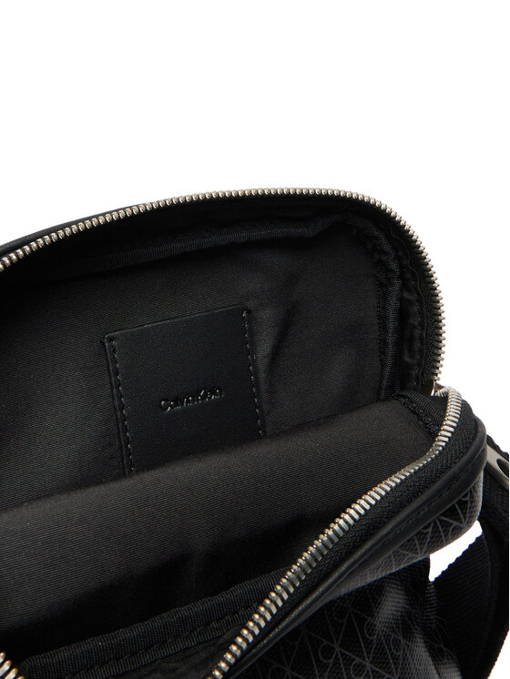 Calvin Klein Calvin Klein Geantă crossover Emblem Aop Coated Slim Reporter LV04D3334G Negru