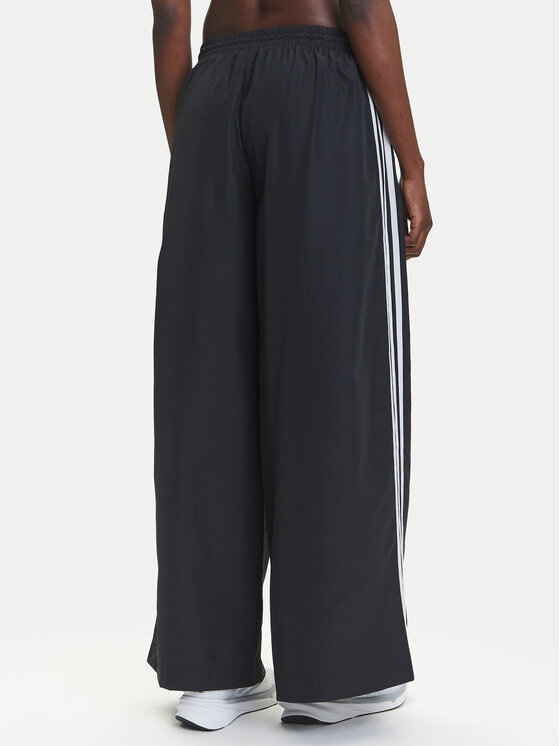 adidas adidas Pantaloni da tuta adicolor Firebird JD3390 Nero Loose Fit