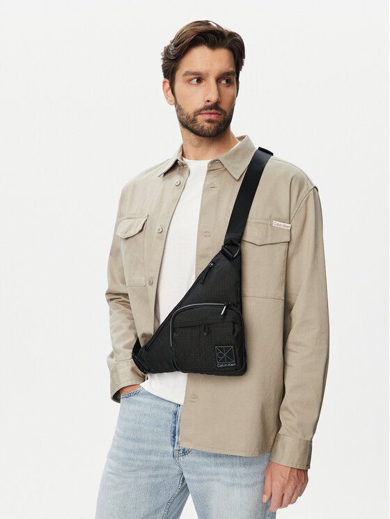 Calvin Klein Geantă crossover Utility Emblem Aop Crossbody LV04D3386G Negru