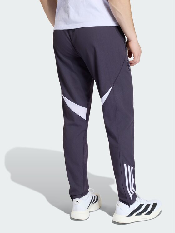 adidas adidas Spodnie materiałowe 161619 Fioletowy Regular Fit