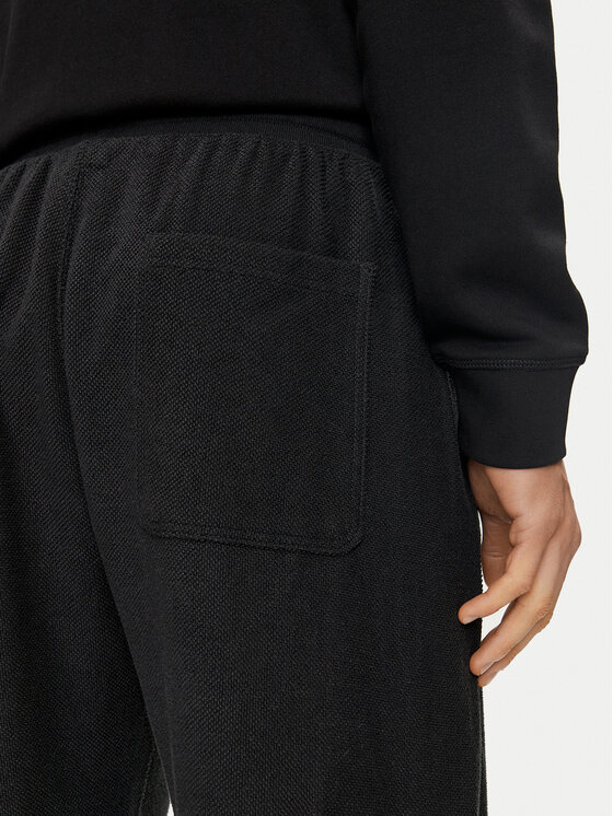 adidas adidas Долнище анцуг Elevated ALL SZN Terry Loop IV5210 Черен Loose Fit
