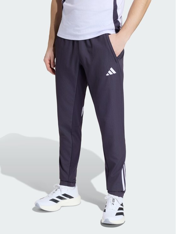 adidas adidas Spodnie materiałowe 161619 Fioletowy Regular Fit