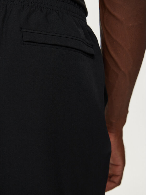 Under Armour Under Armour Pohodne hlače UA Unstoppable 1388823 Črna Loose Fit