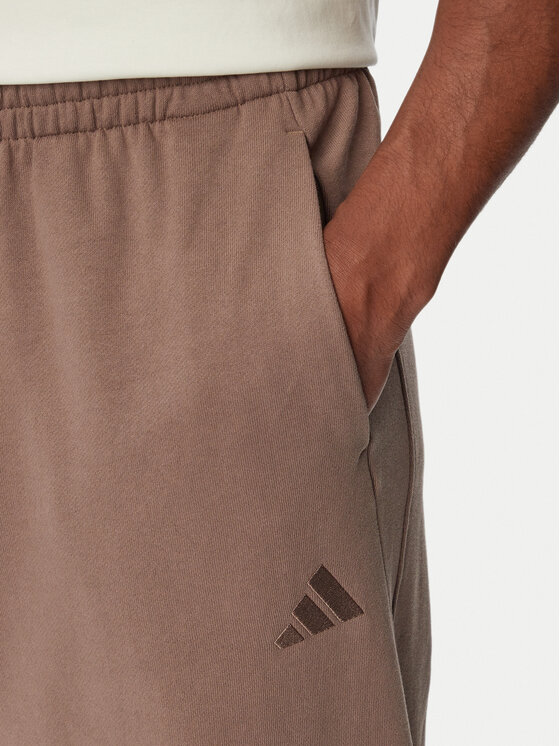 adidas adidas Dressipüksid Kit Small Logo Wide KW2339 Beež Relaxed Fit