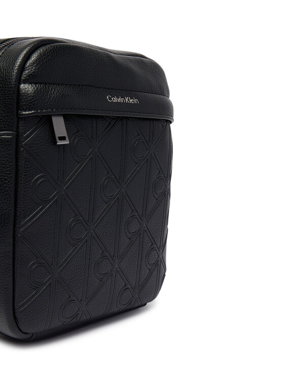 Calvin Klein Calvin Klein Torbica za okrog pasu Emblem Aop Deboss Reporter LV04D3562G Črna
