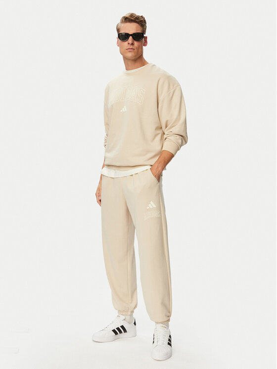 adidas adidas Dressipüksid Seasonal Essentials Collegiate French Terry Cuffed KF4265 Beež Regular Fit