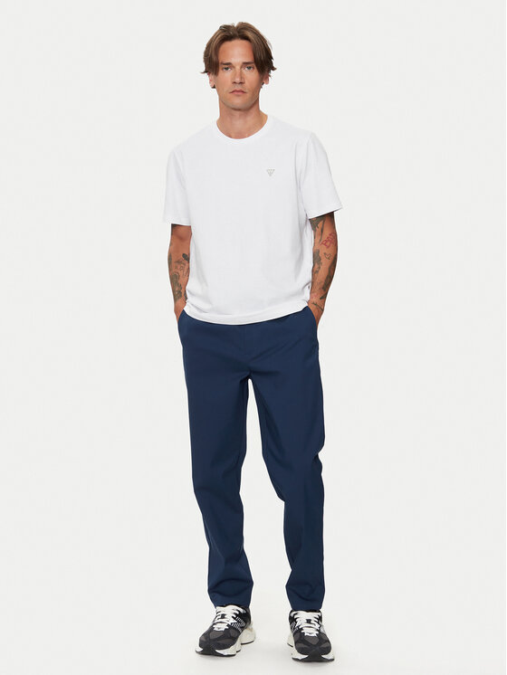New Balance New Balance Pantaloni din material Athletics Standard MP43554NNY Bleumarin Regular Fit