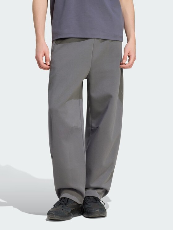 adidas adidas Pantaloni di tessuto Z.N.E. OPEN HEMZ.N.E. OPEN HEM Grigio Loose Fit