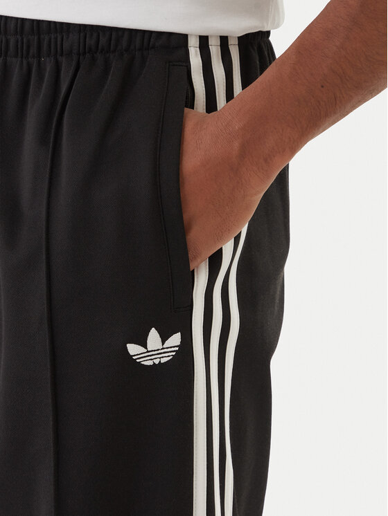 adidas adidas Pantaloni trening adicolor KE3501 Negru Loose Fit