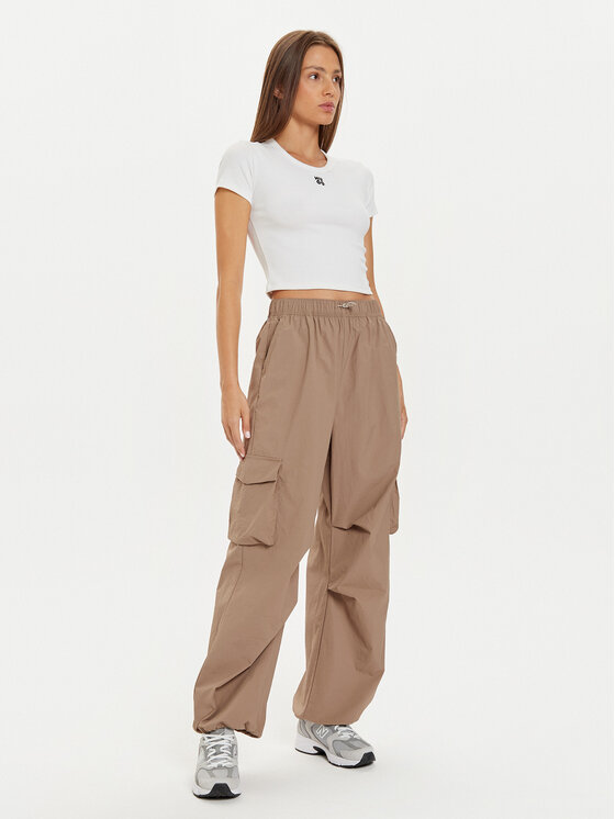 New Balance New Balance Donji dio trenerke WP43534 Bež Relaxed Fit
