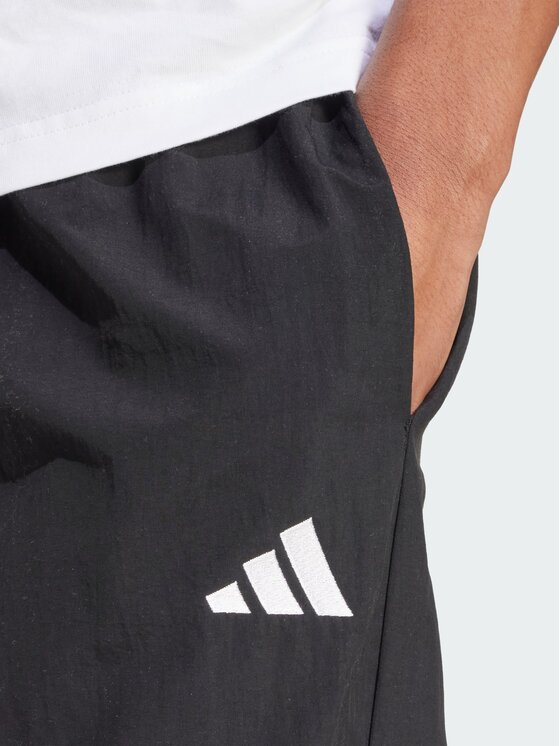 adidas adidas Spodnie materiałowe 151555 Czarny Loose Fit