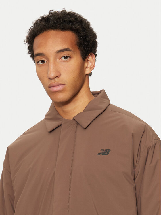 New Balance New Balance Prehodna jakna MJ43504 Rjava Regular Fit