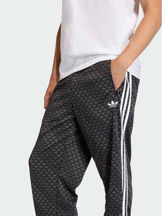 adidas adidas Spodnie dresowe Firebird loose monogram Czarny Regular Fit