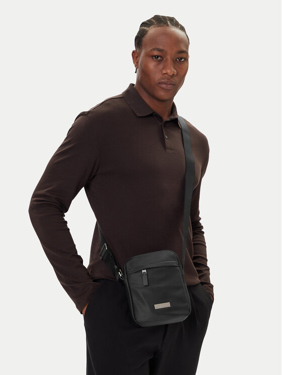 Calvin Klein Calvin Klein Geantă crossover Sleek Reporter LV04D3180G Negru