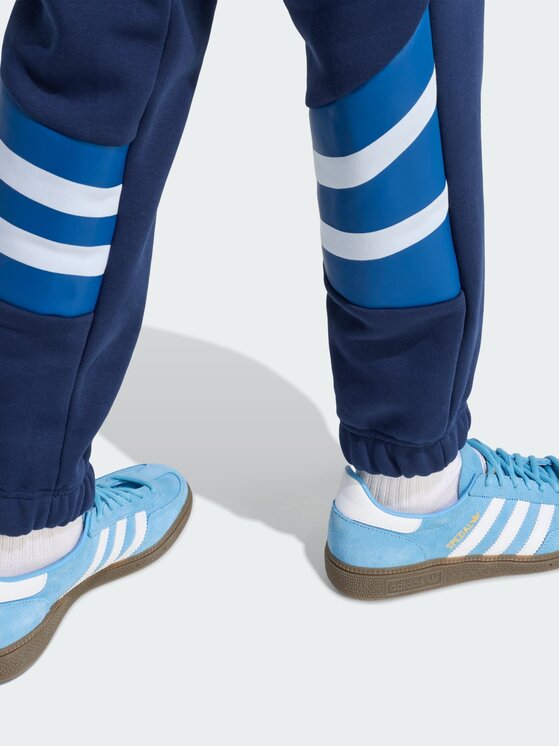 adidas adidas Spodnie materiałowe 159172 Niebieski jasny Loose Fit