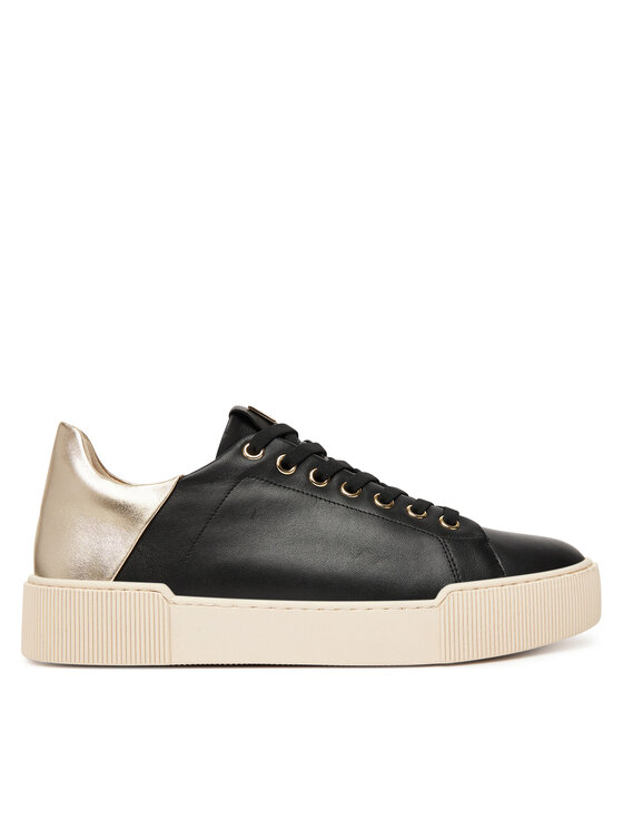 Sneaker widziany z boku, pokazana cała cholewka i podeszwa.