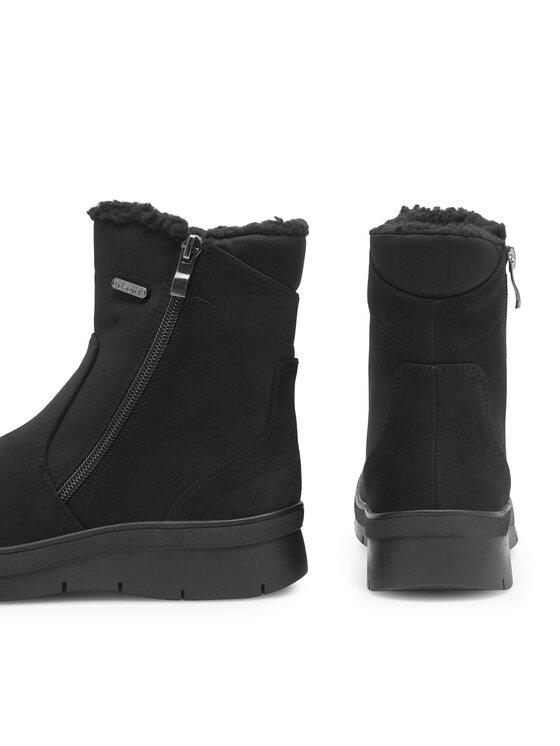 Dwa buty ustawione pionowo, widok na boki cholewek.