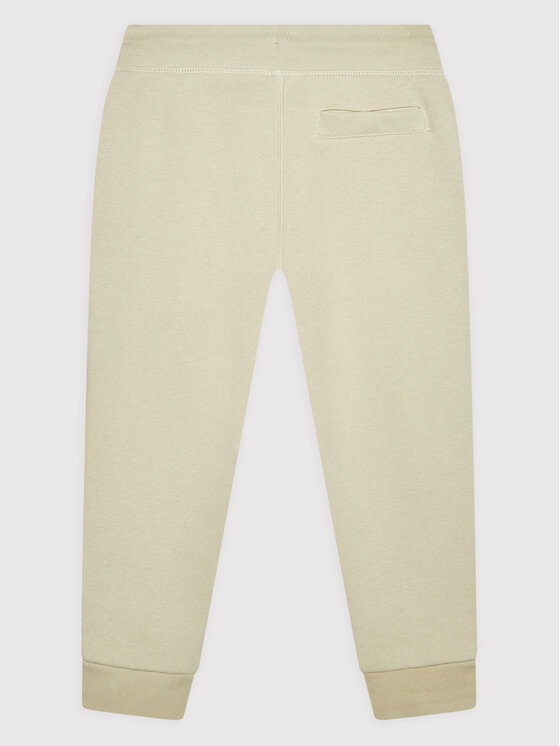 Guess Guess Spodnie dresowe L2YQ46 KAIJ1 Beżowy Regular Fit