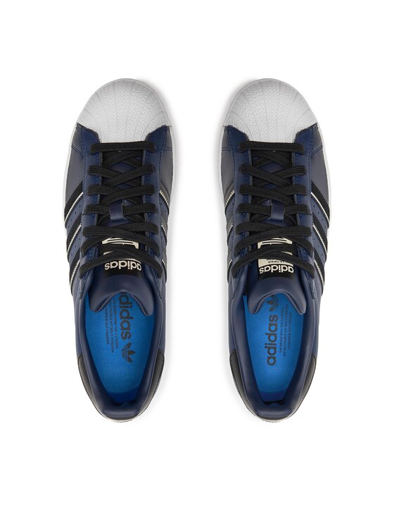 Adidas superstar bianche e blu scuro new arrivals