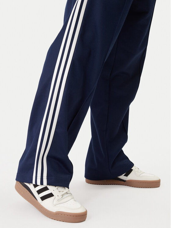 adidas adidas Pantaloni da tuta adicolor KE3496 Blu scuro Loose Fit
