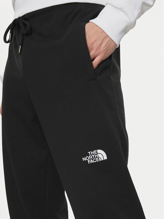 The North Face The North Face Donji dio trenerke Nse Light NF0A4T1F Crna Regular Fit